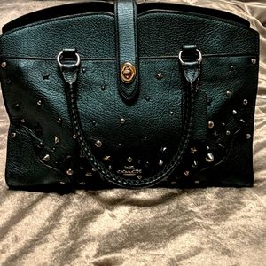 Metallic blue star and rivets coach satchel